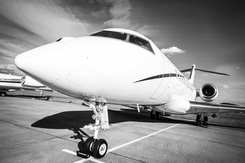 Private jet aircraft parked at airport