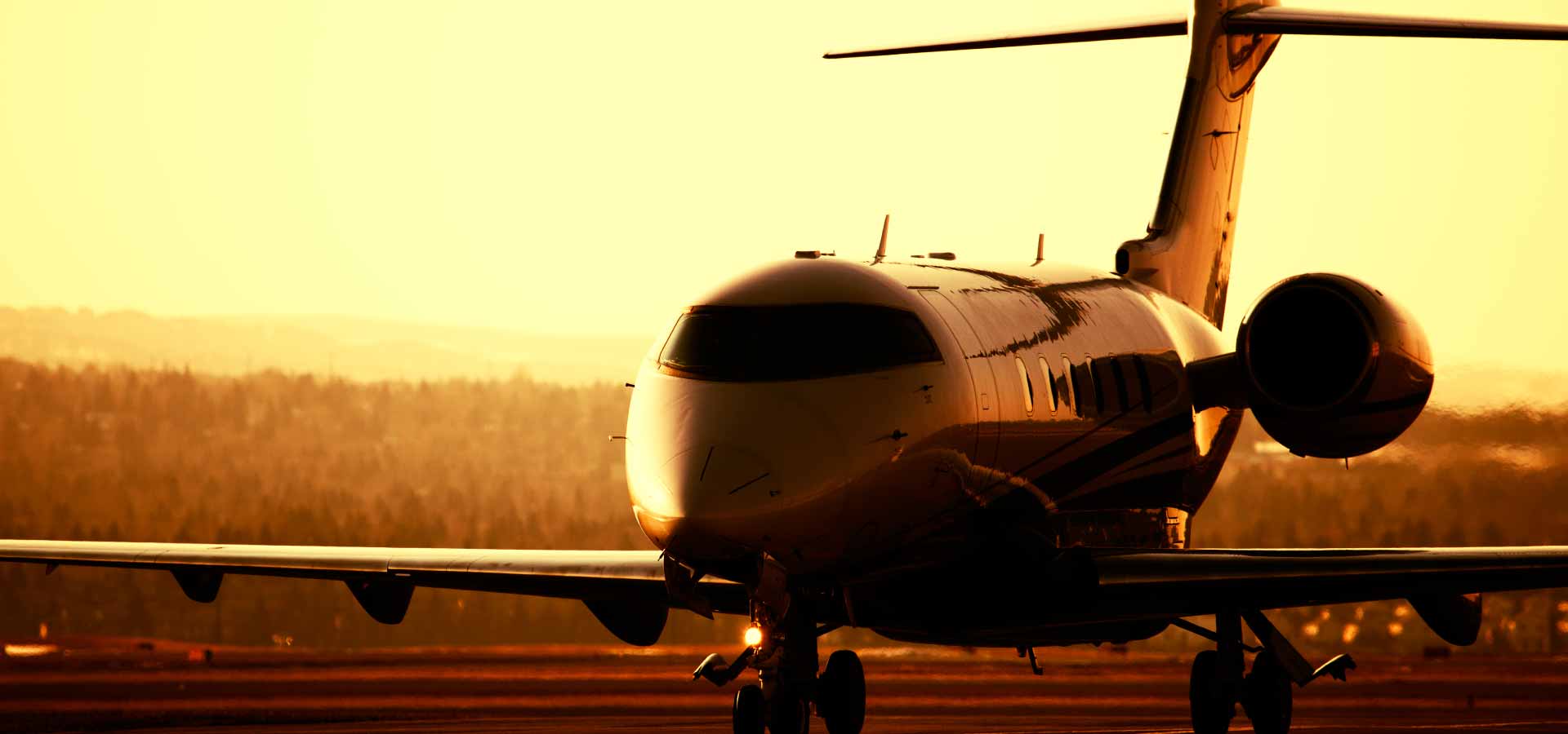 Aircraft taxying during sunset