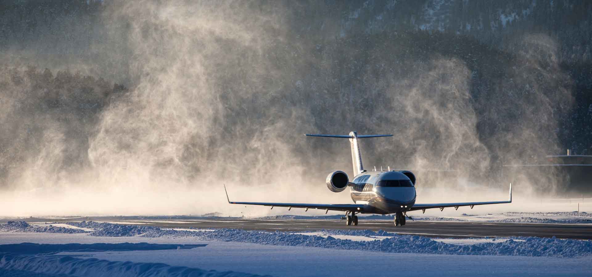 Aircraft departing in snowy conditions