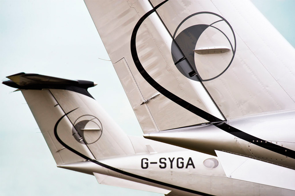 Tails of Synergy Aviation's King Air B200 aircraft